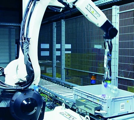 pick-it-easy robot handling assorted food items with precision to enhance efficiency and accuracy in grocery fulfillment
