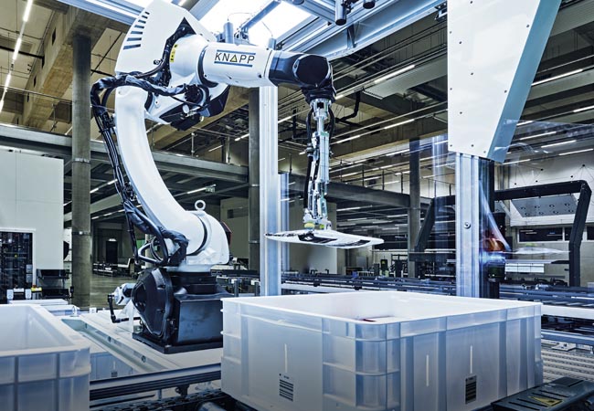 robotic itck it easy gripper using intelligent automation specific data with a 3d camera analyzing packaging type center of gravity pickability tilting behavior and stackability demonstrating how data driven robotics boost performance and enable faster more efficient item handling in automated fulfillment environments.