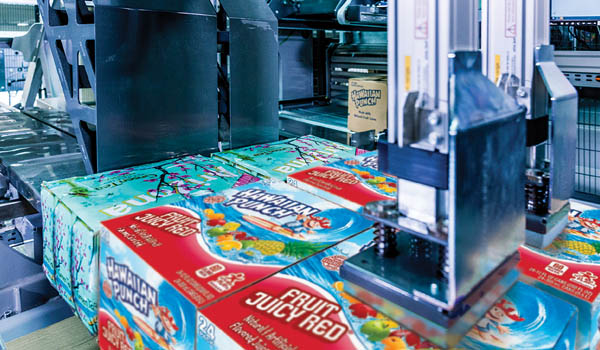 Image of an automated palletizing system stacking cases onto pallets with precision, highlighting how robotics and intelligent handling equipment improve stability, efficiency, and throughput in fast‑moving distribution environments.