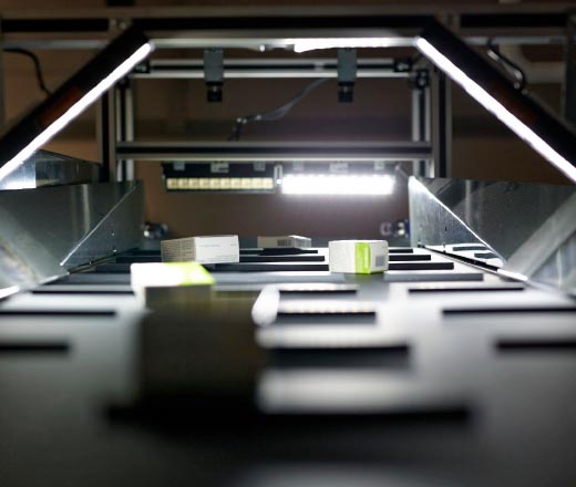 ivii‑belt‑41 verifying all SKUs dispensed by the A‑Frame by capturing high‑resolution images and automating item validation to improve accuracy, traceability, and throughput in fast‑moving distribution environments.