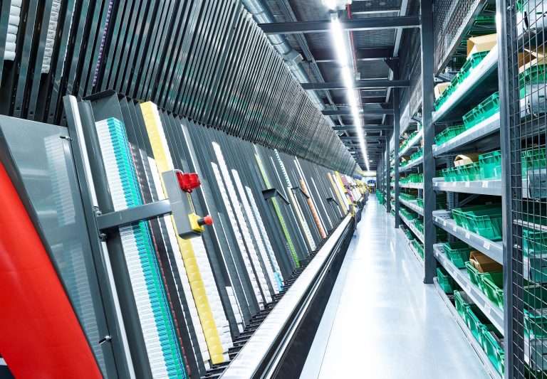 KNAPP A‑Frame automated dispensing system rapidly fulfilling high‑volume, low‑margin items to reduce labor costs, increase order accuracy, and maximize distribution profitability.