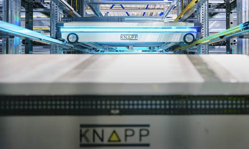 Stacked warehouse shuttles operating in a high‑density storage system to enable fast, flexible, and efficient store delivery replenishment across dynamic retail networks.
