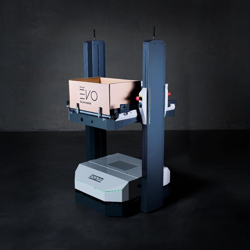 KNAPP autonomous mobile robots transporting containers through a warehouse environment, demonstrating efficient point‑to‑point movement, intelligent routing, and seamless integration within automated intralogistics workflows.