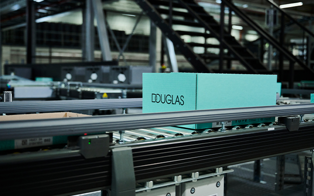KNAPP Douglas Group and Arvato case study image illustrating how advanced automation, intelligent software, and streamlined fulfillment processes enable efficient beauty and personal care distribution with improved accuracy, higher throughput, and reliable large‑scale logistics performance.