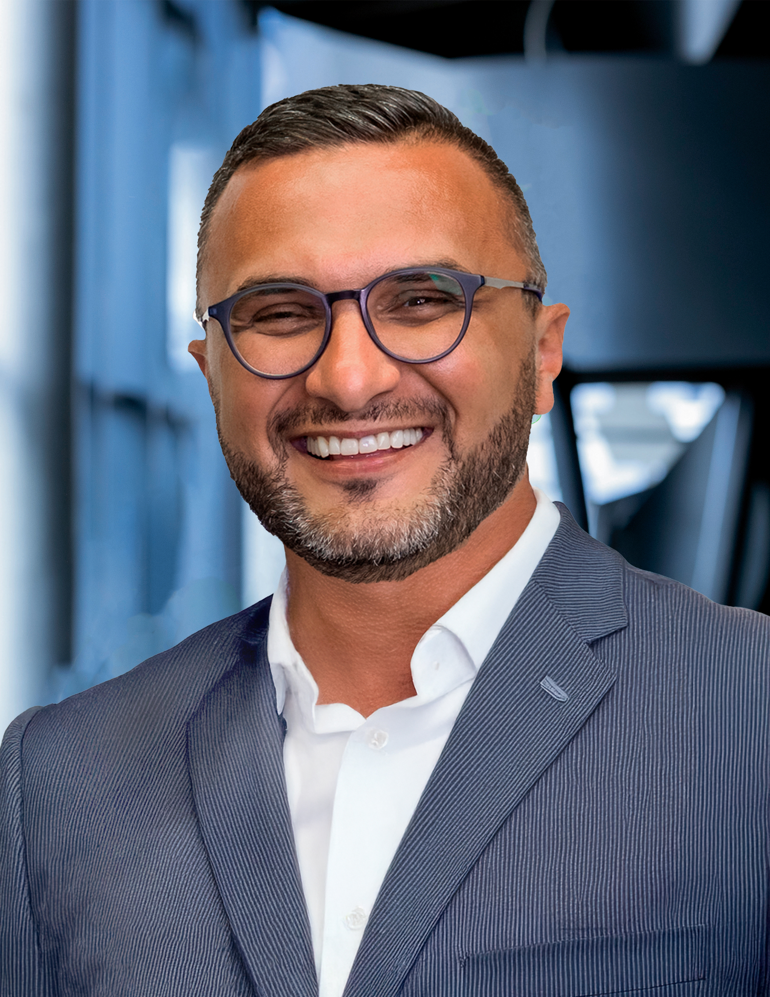 Portrait of Jusuf Buzimkic, CSO of KNAPP North America, emphasizing his leadership in sales strategy, customer partnerships, and the company’s continued growth in intelligent automation solutions across the region.