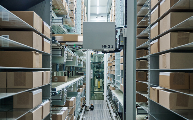 Luxottica warehouse interior photograph representing a KNAPP customer partnership and showcasing their large‑scale eyewear distribution operations supported by advanced automation, storage, and fulfillment solutions.