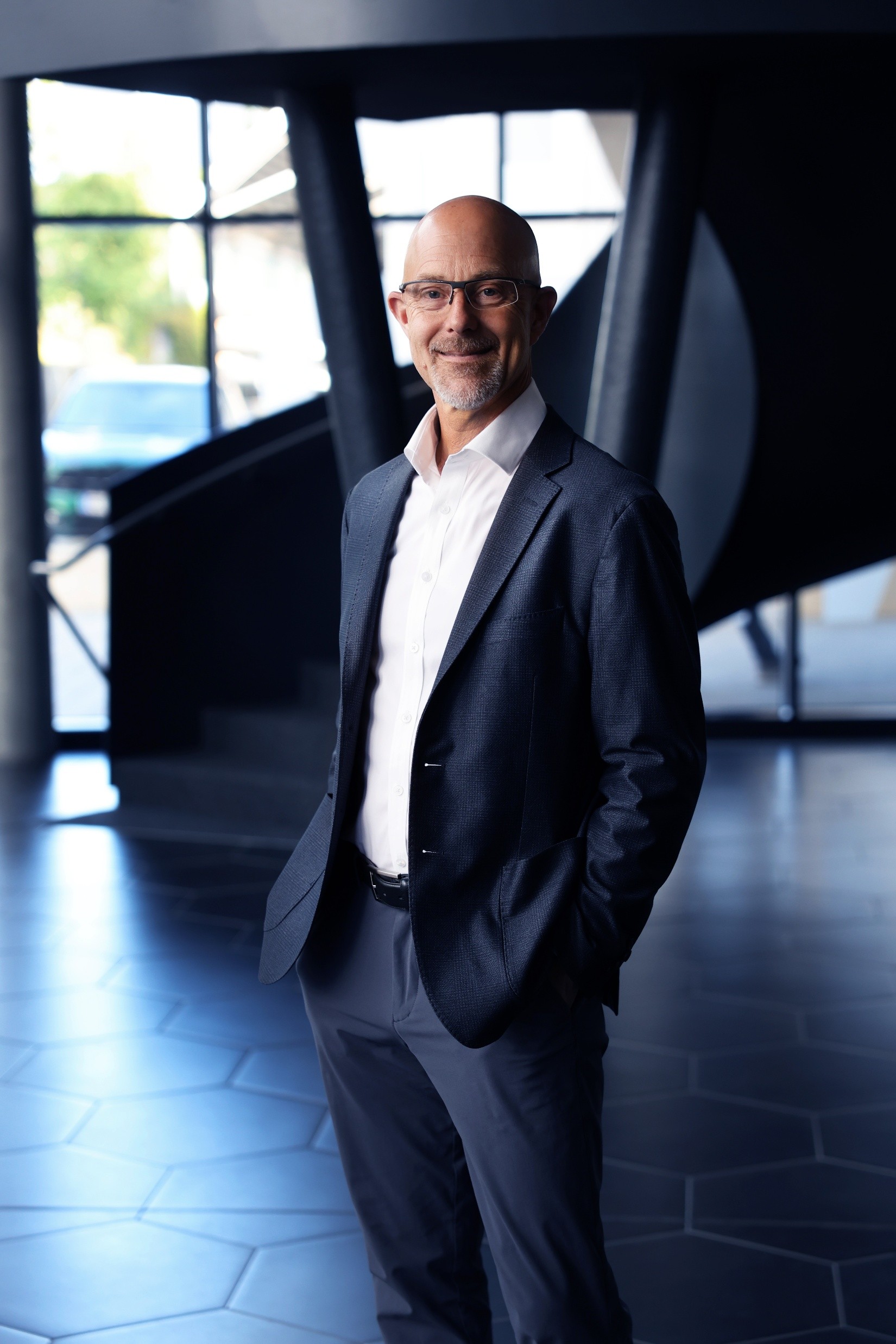 Portrait of Josef Mentzer, CEO of KNAPP North America, representing the company’s executive leadership, strategic vision, and commitment to innovative automation solutions across the region.