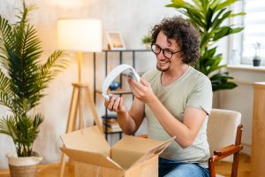Fulfillment associates and automated systems preparing orders for same‑day or next‑day delivery, highlighting KNAPP’s high‑speed picking, optimized packing, and time‑critical logistics processes designed to meet rapid e‑commerce service expectations.