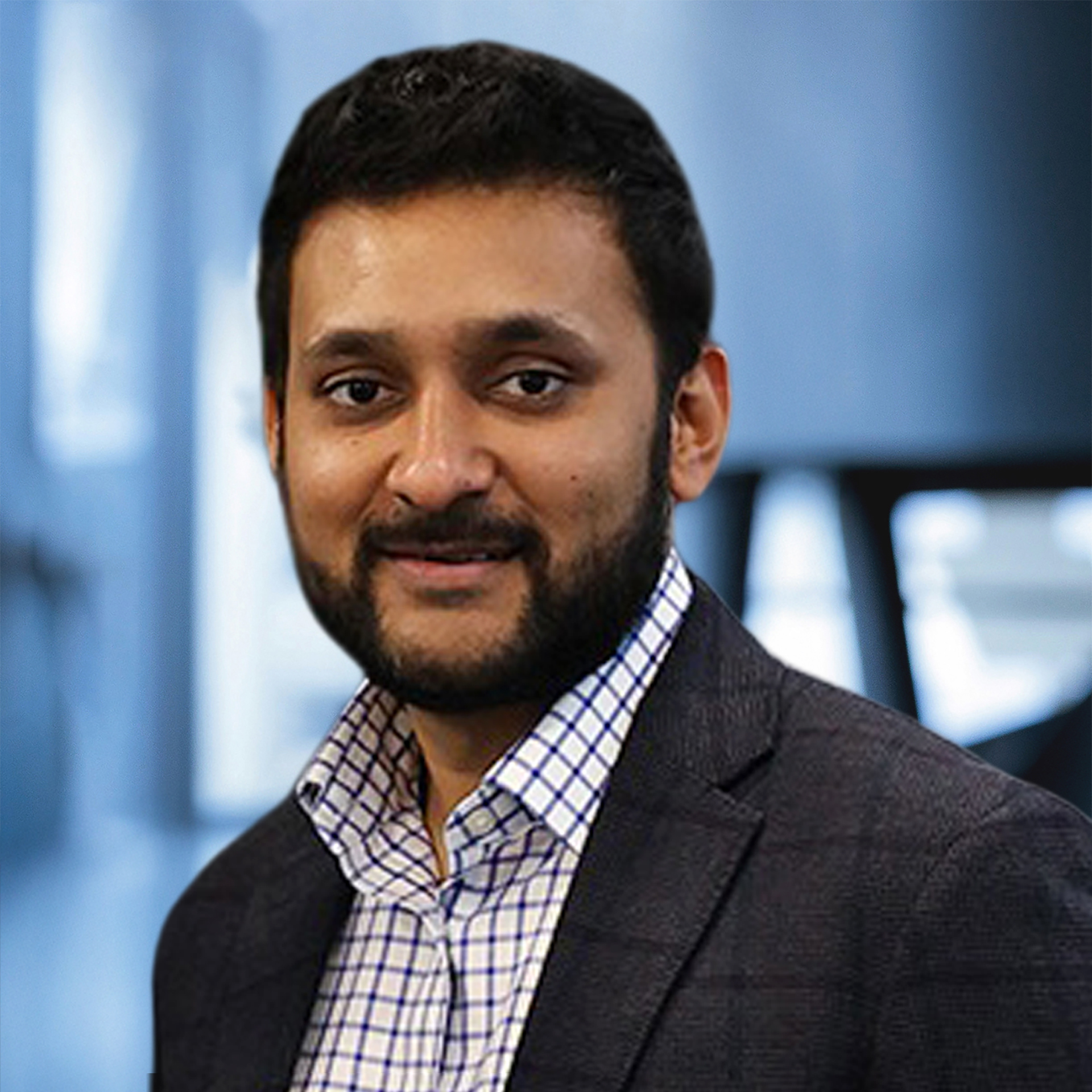 Deep Tayal, Senior Vice President of Customer Service for KNAPP North America, professional headshot emphasizing executive leadership in lifecycle services, automation support, and long‑term customer success.
