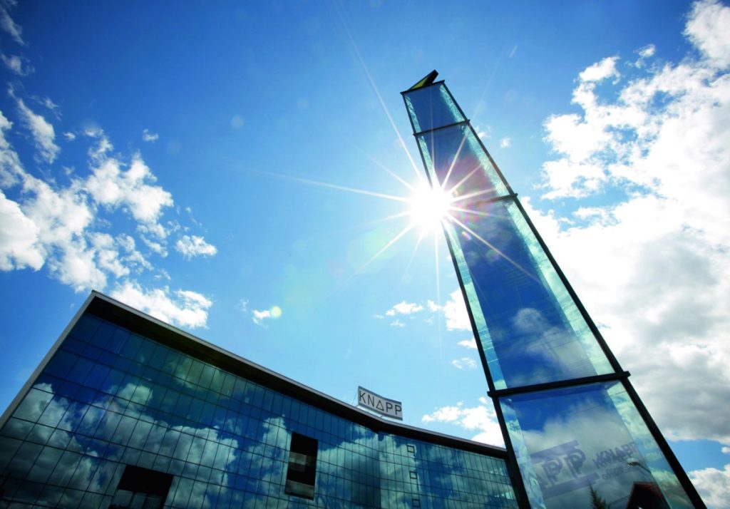 A photograph of KNAPP’s global headquarters building in Hart bei Graz, showcasing the modern architecture and central campus that has served as the base for the company’s growth, innovation, and historical development over the decades.